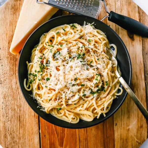 Break-Up Pasta is a creamy 3-Cheese Spaghetti Recipe made with butter, garlic, cream, broth, Italian cheeses, spices, and tossed in spaghetti. It is the best creamy spaghetti recipe known to help cure breakups!