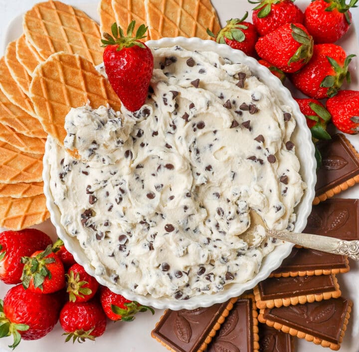 This is the Best Cannoli Dip Recipe made with ricotta cheese, mascarpone or cream cheese, powdered sugar, brown sugar, vanilla, and mini chocolate chips. 