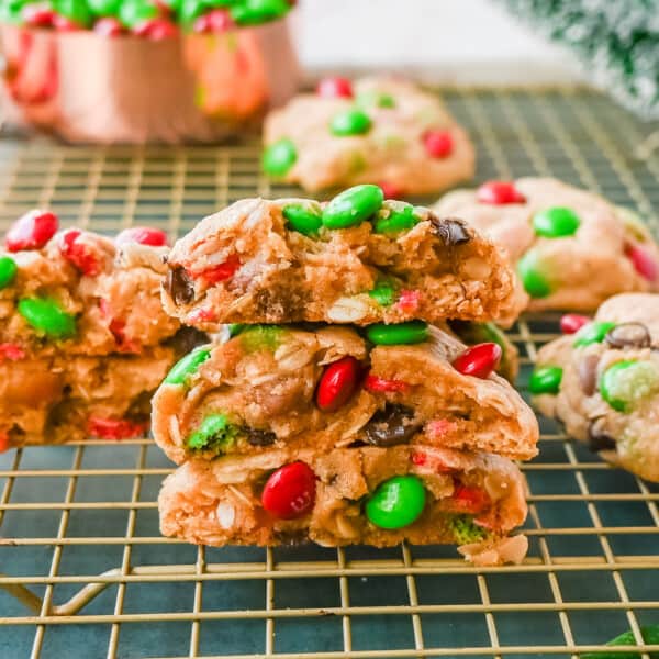 Christmas M & M Cookies. These popular, soft, thick, and chewy Christmas Monster Cookies are made with oats, peanut butter, chocolate chips, and holiday red and green M & M's. They are an easy Christmas cookie that can be made in minutes.