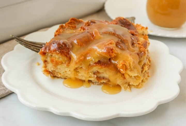  Croissant Bread Pudding with Vanilla Sauce is made with croissants baked in a custard sauce and topped with a homemade vanilla bean sauce. The most decadent dessert or breakfast recipe!