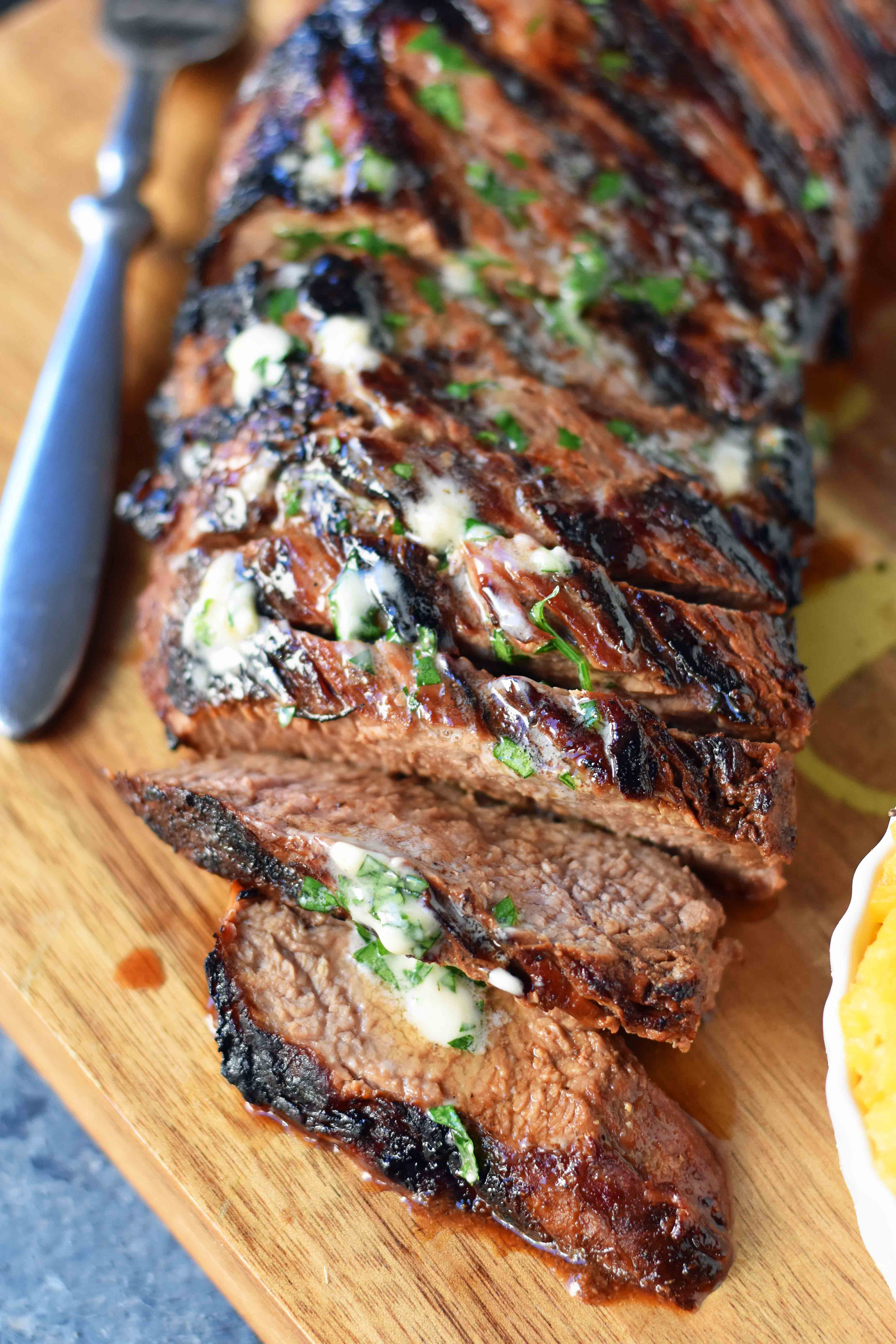Grilled Tri-Tip Steak Marinade. How to make a juicy and flavorful tri-tip steak on the grill paired with Alexia premium side dishes. www.modernhoney.com