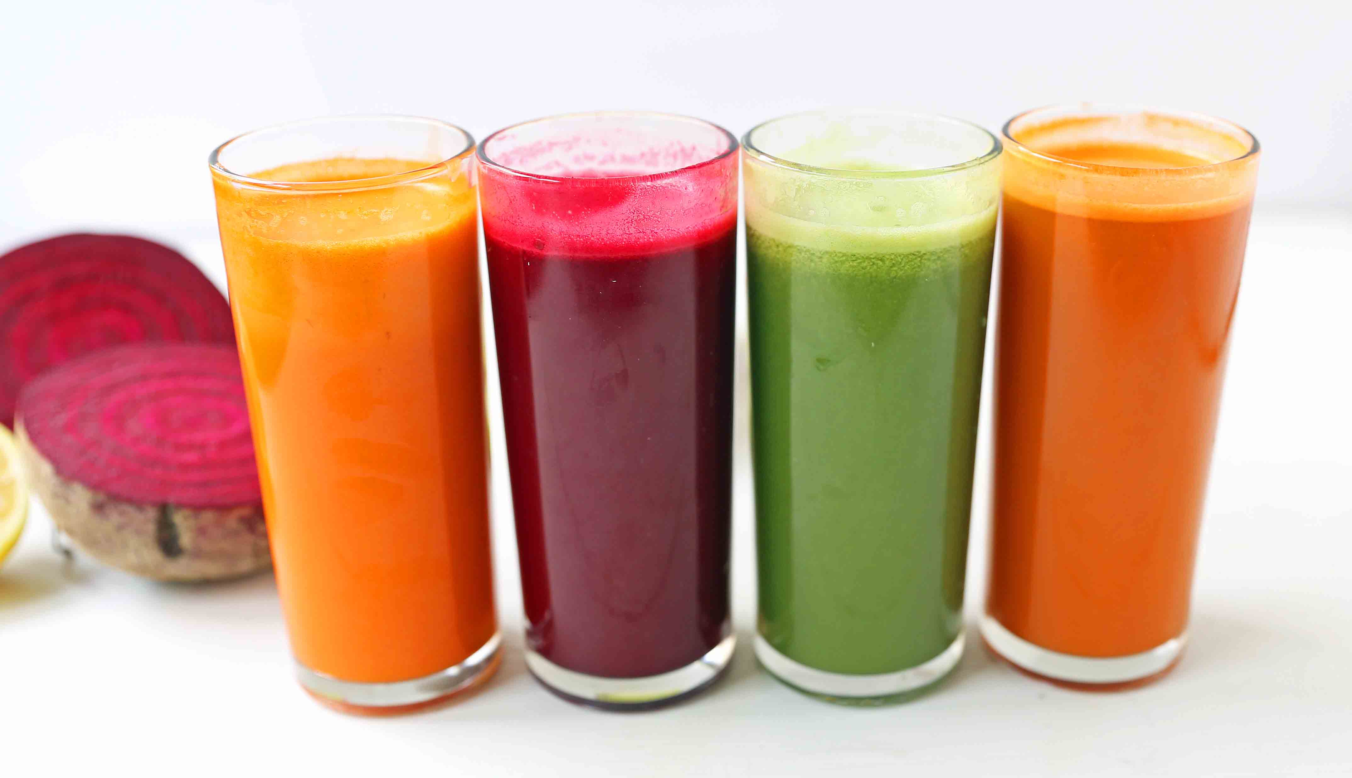 Healthy Juice Cleanse Recipes. Four health fresh fruit and vegetable juice recipes. How to make fresh juices at home for a fraction of the price. Find out the immune boosting and health benefits from juicing. www.modernhoney.com #juicing #juices #fruitandvegetablejuices #juicingrecipes