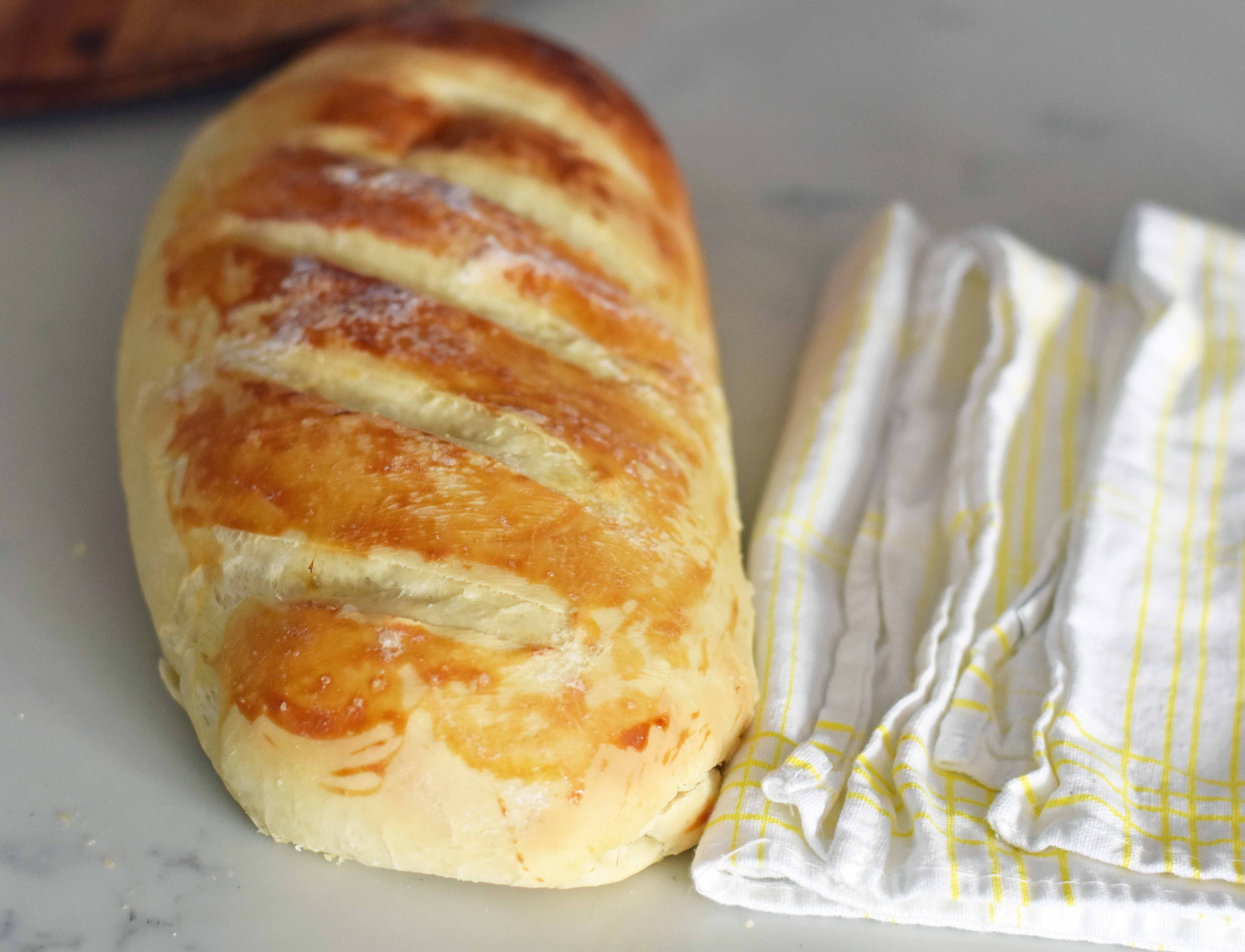 Easy Homemade Bakery French Bread. Quick and easy homemade french bread made at home. Kids can make this bread! Super easy to follow foolproof recipe. www.modernhoney.com