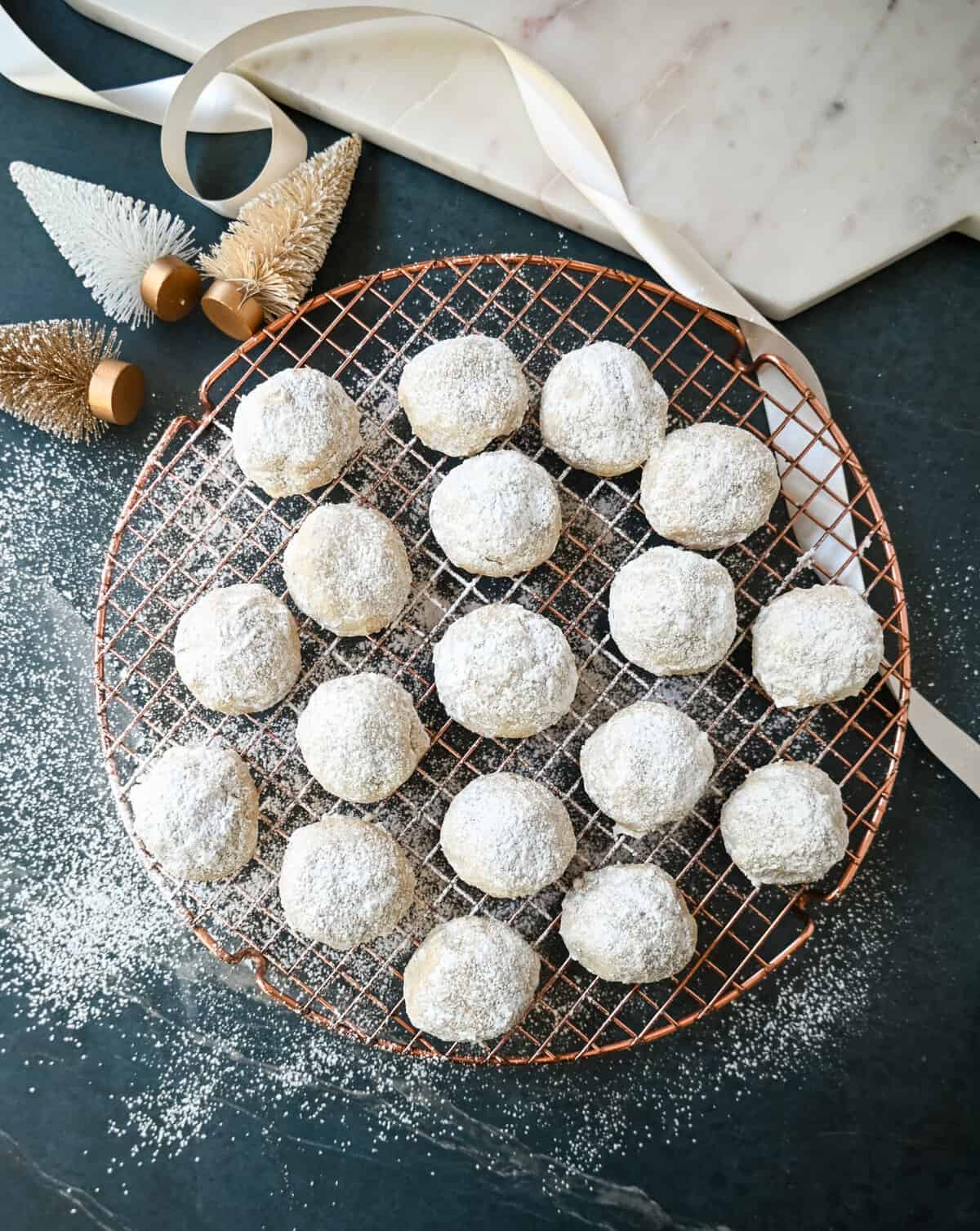Mexican Wedding Cookies (Snowball Cookies). These buttery, nutty, Mexican wedding cookies are so easy to make and call for only 5 ingredients. These melt-in-your-mouth cookies are perfect to make during the holidays and everyone loves them. The perfect Christmas cookie recipe. 