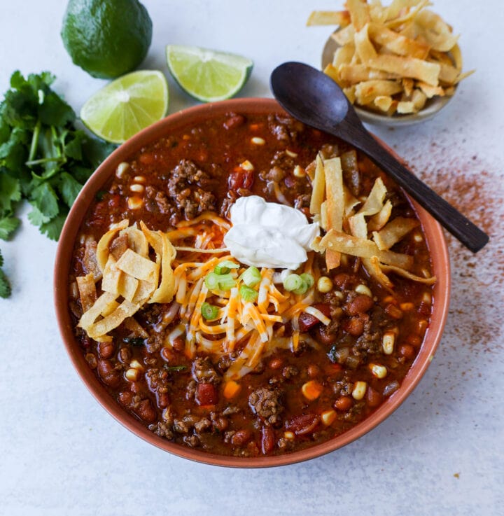 Quick and Easy 30-minute Taco Soup Recipe has all of the flavors of tacos made into a soup! 